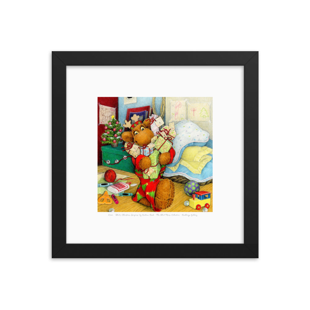 Framed Children's Book Art Print -- Cover of Elliot's Christmas Surprise by Andrea Beck. Happy Elliot Moose holds an armful of gifts he made for his friends.