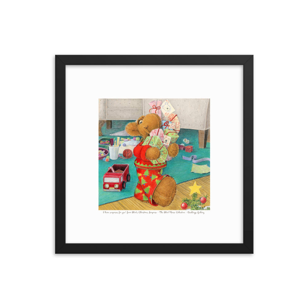 Framed art print of children's book character Elliot Moose carrying an armful of Christmas gifts, excited for Christmas. From the book Elliot's Christmas Surprise by Andrea Beck